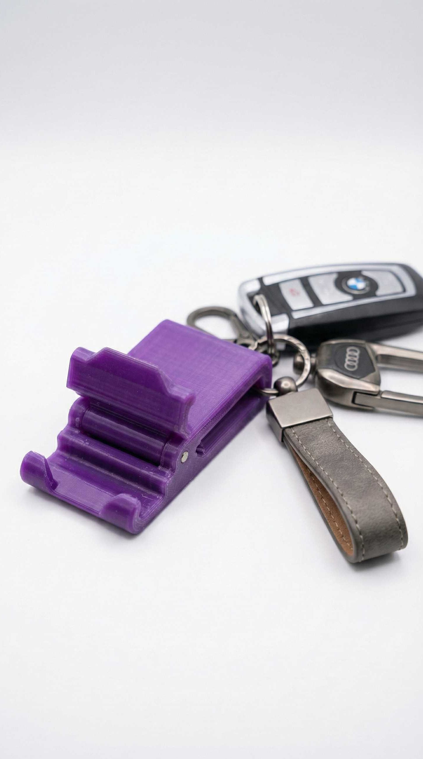 Suport telefon tip breloc